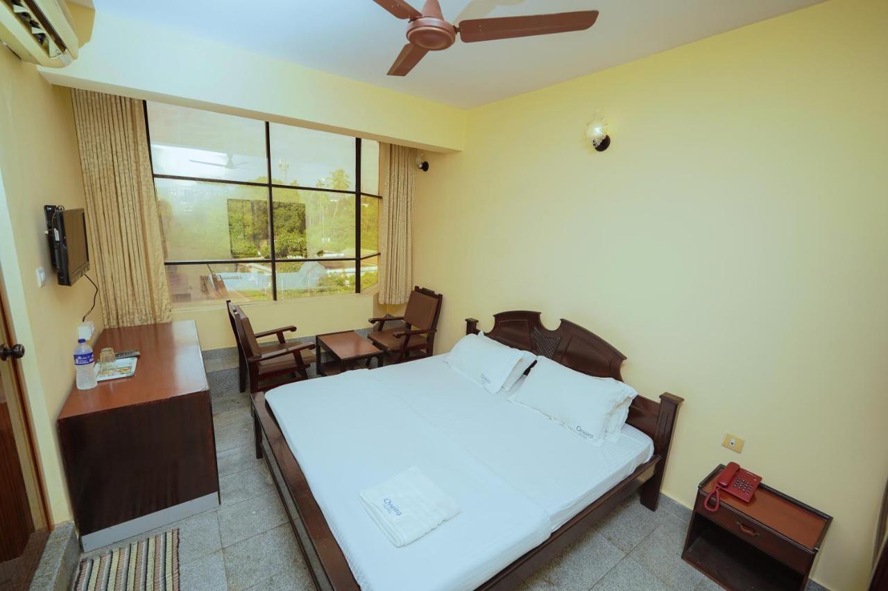 Hotel Oneiro Thrissur Екстер'єр фото